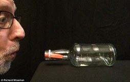 Blowing into the bottle